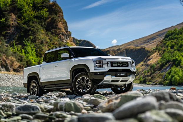 Shark 6 on a rocky trail beside a river